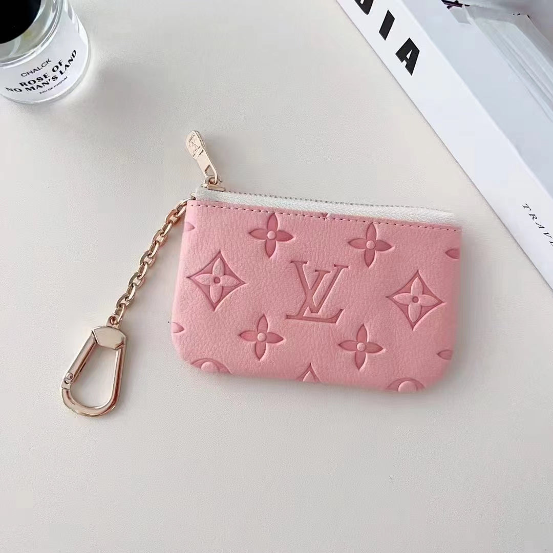 Coleção colorida de bolsas para moedas em relevo inspirada em LV com clipe de corrente