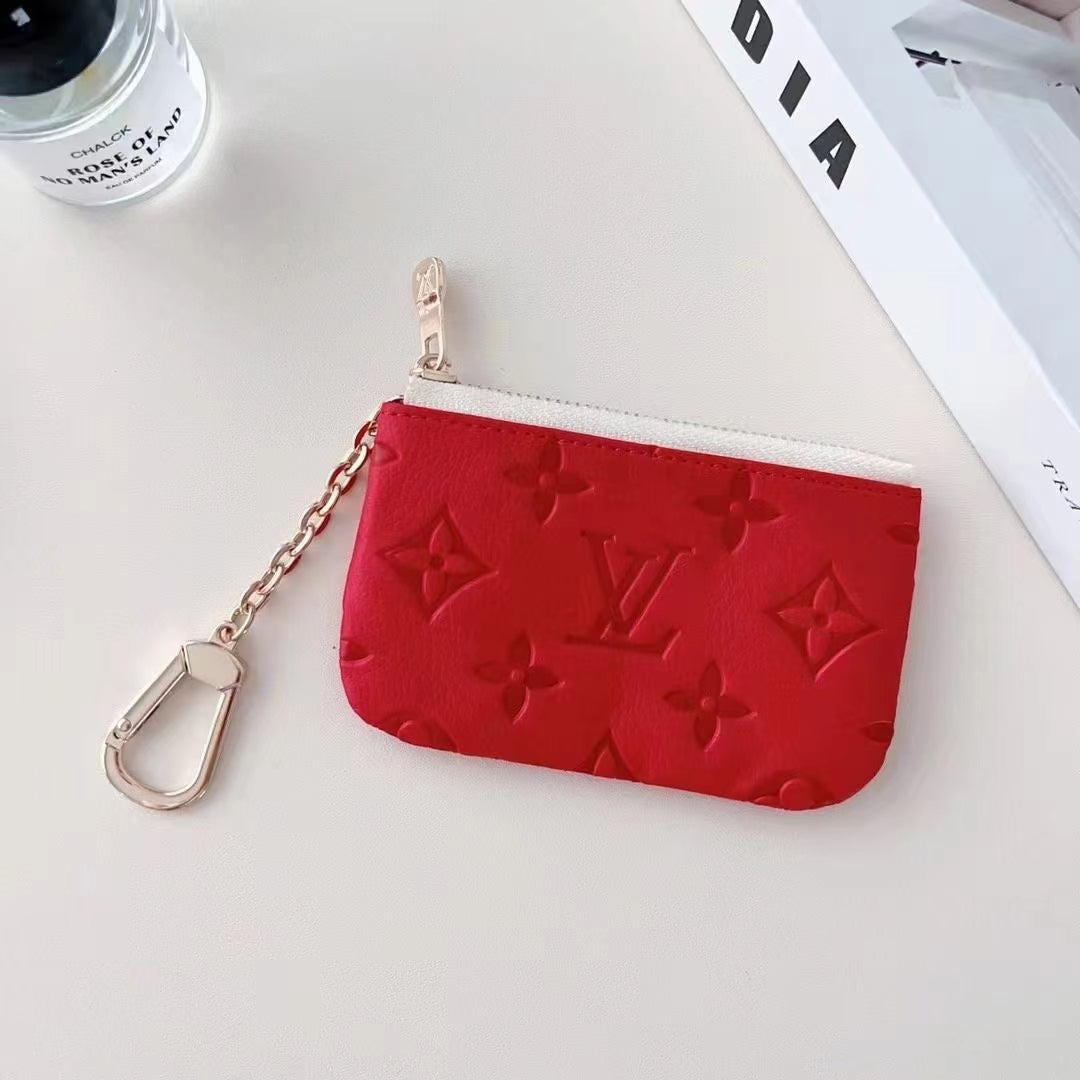 Coleção colorida de bolsas para moedas em relevo inspirada em LV com clipe de corrente