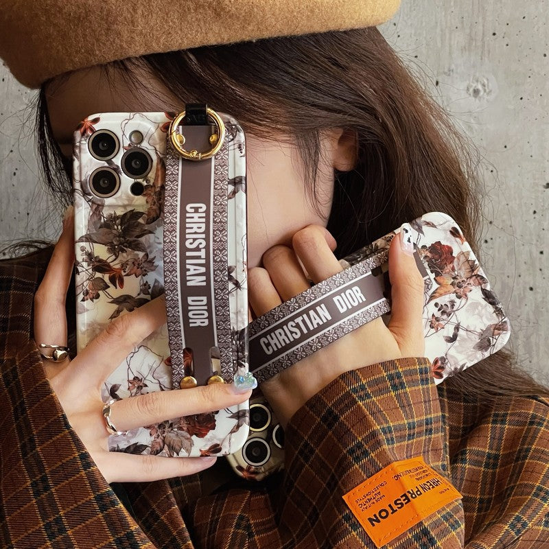 Capa para iPhone com pulseira de folha de bordo da moda