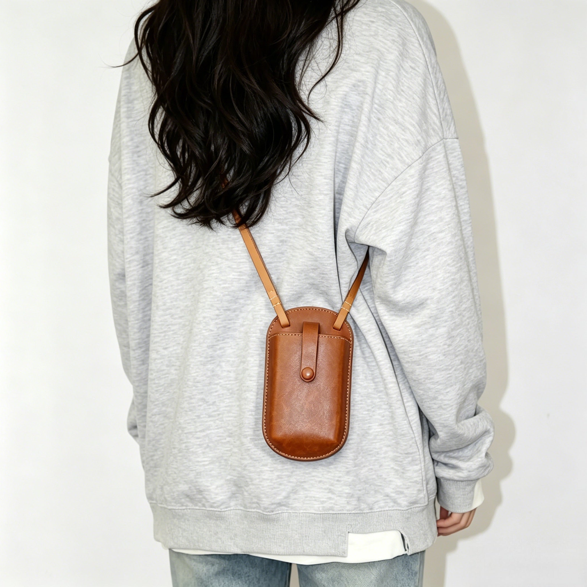 Handmade leather phone bag with shoulder strap