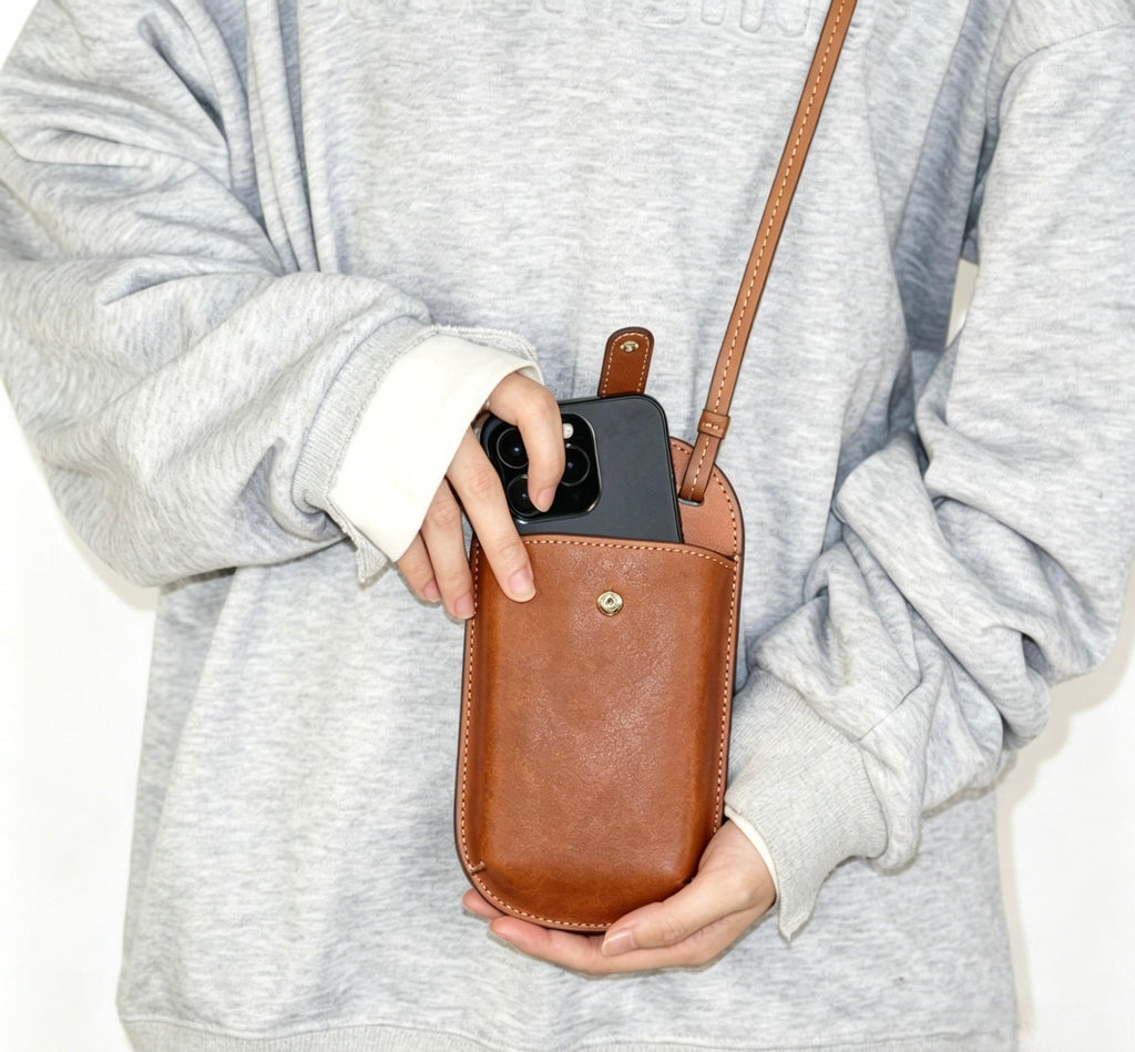 Handmade leather phone bag with shoulder strap