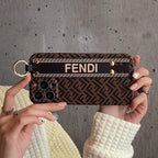 Eleganckie etui na iPhone'a z opaską na nadgarstek