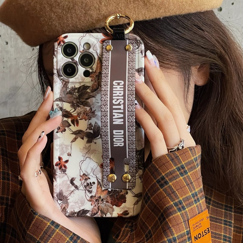 Capa para iPhone com pulseira de folha de bordo da moda