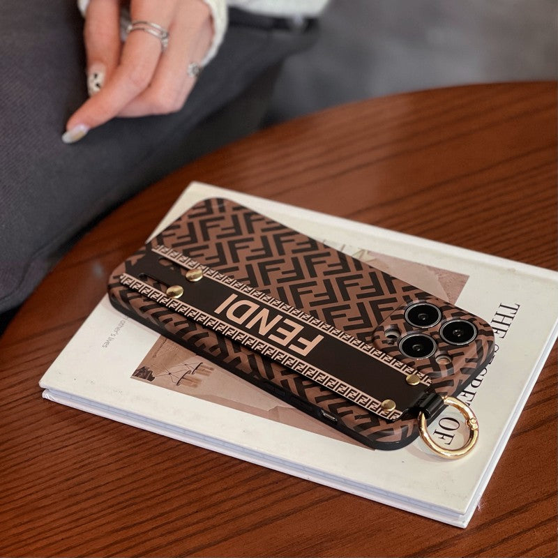 Eleganckie etui na iPhone'a z opaską na nadgarstek
