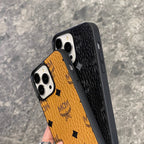 MCM iPhone-kotelo musta-MCK240603