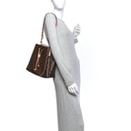 Classic Printed Canvas Bucket Bag with Soft Pink Leather Details