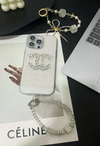 Elegant lyxigt iPhonefodral i kristall med armbandsrem