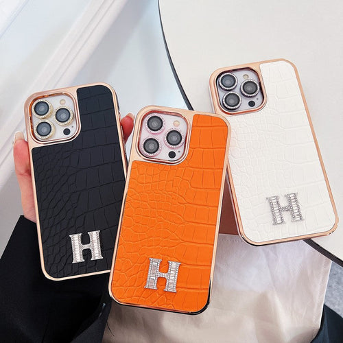 Klasyczne etui na iPhone'a z logo w kształcie diamentu w kolorze różowego złota