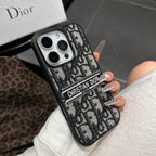 Husă pentru iPhone din material textil, inspirată de designer, cu detalii brodate